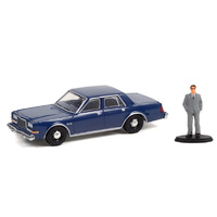 Greenlight - 1/64 1986 Plymouth Grand Fury Unmarked Police Car in Navy Blue with Man in Suit
