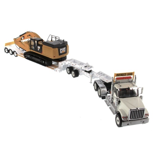 Diecast Masters - 1/50 International white HX520 Tandem Tractor + XL 120 Trailer outriggers, w/ Cat349F L XE Hydraulic Excavator load including both r